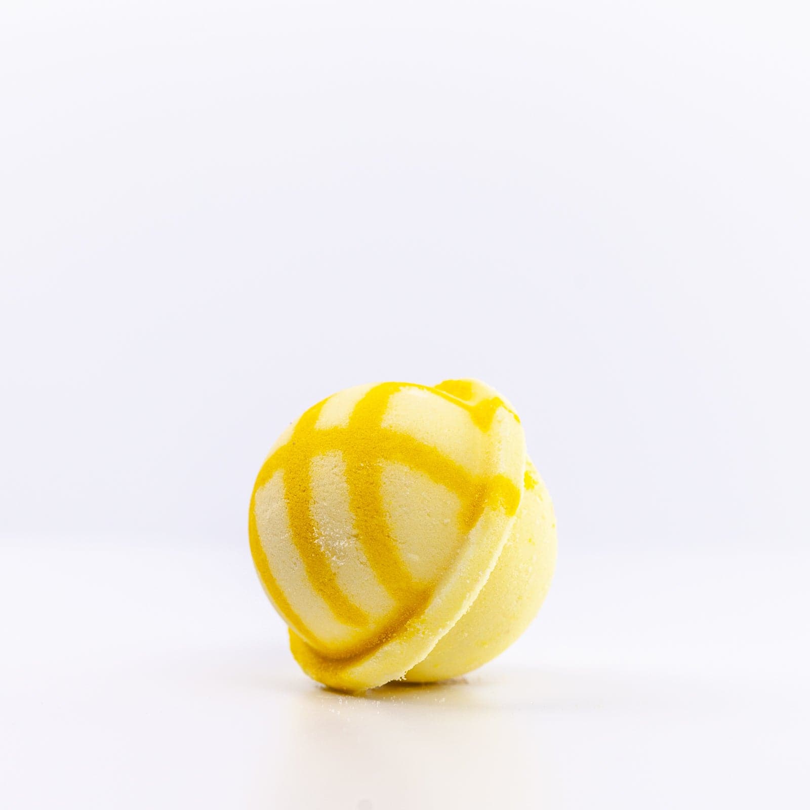 Good Morning Sunshine Bath Bomb with dark yellow design 