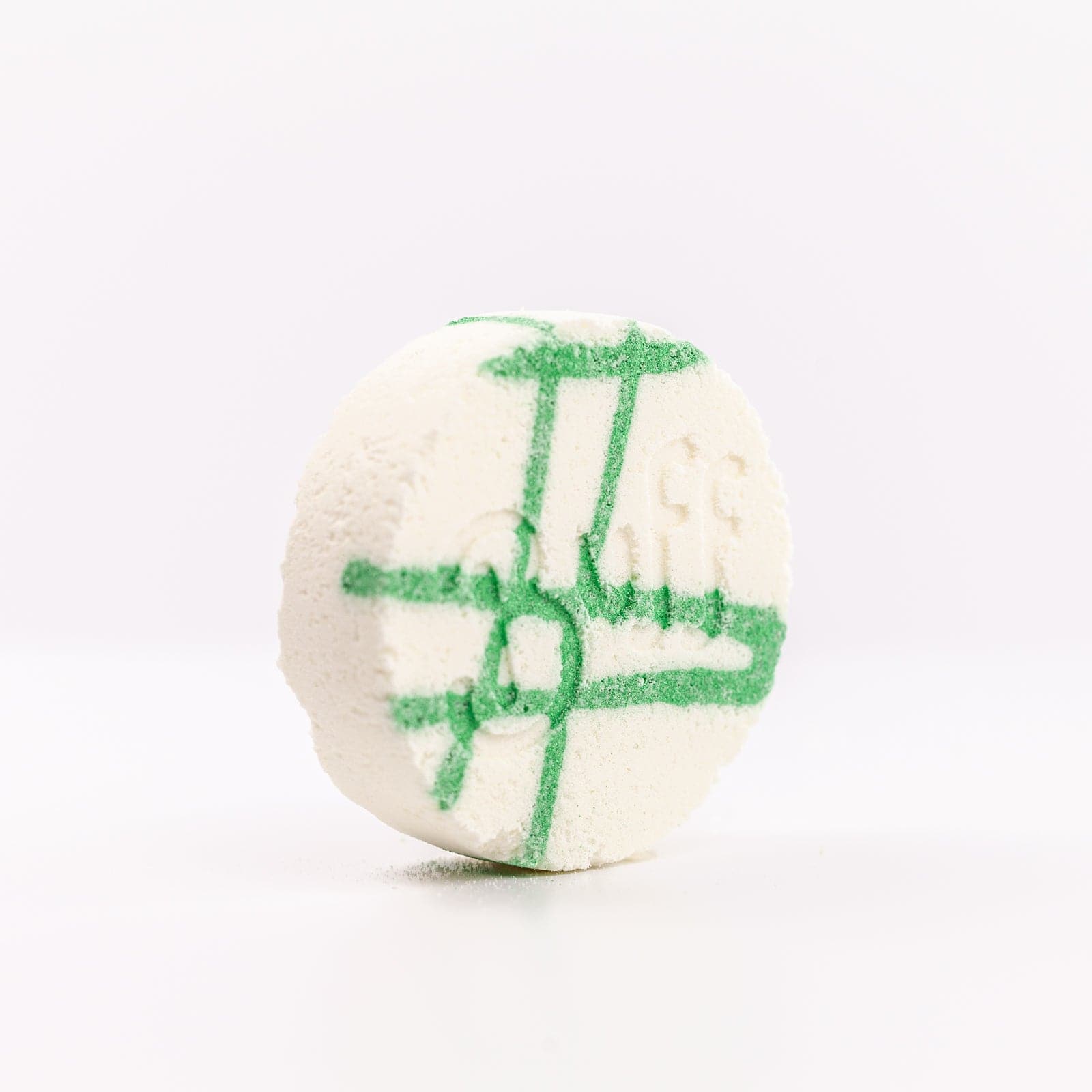 Buff City Soap's lemongrass + eucalyptus scented shower fizzy soap with buff written on its side