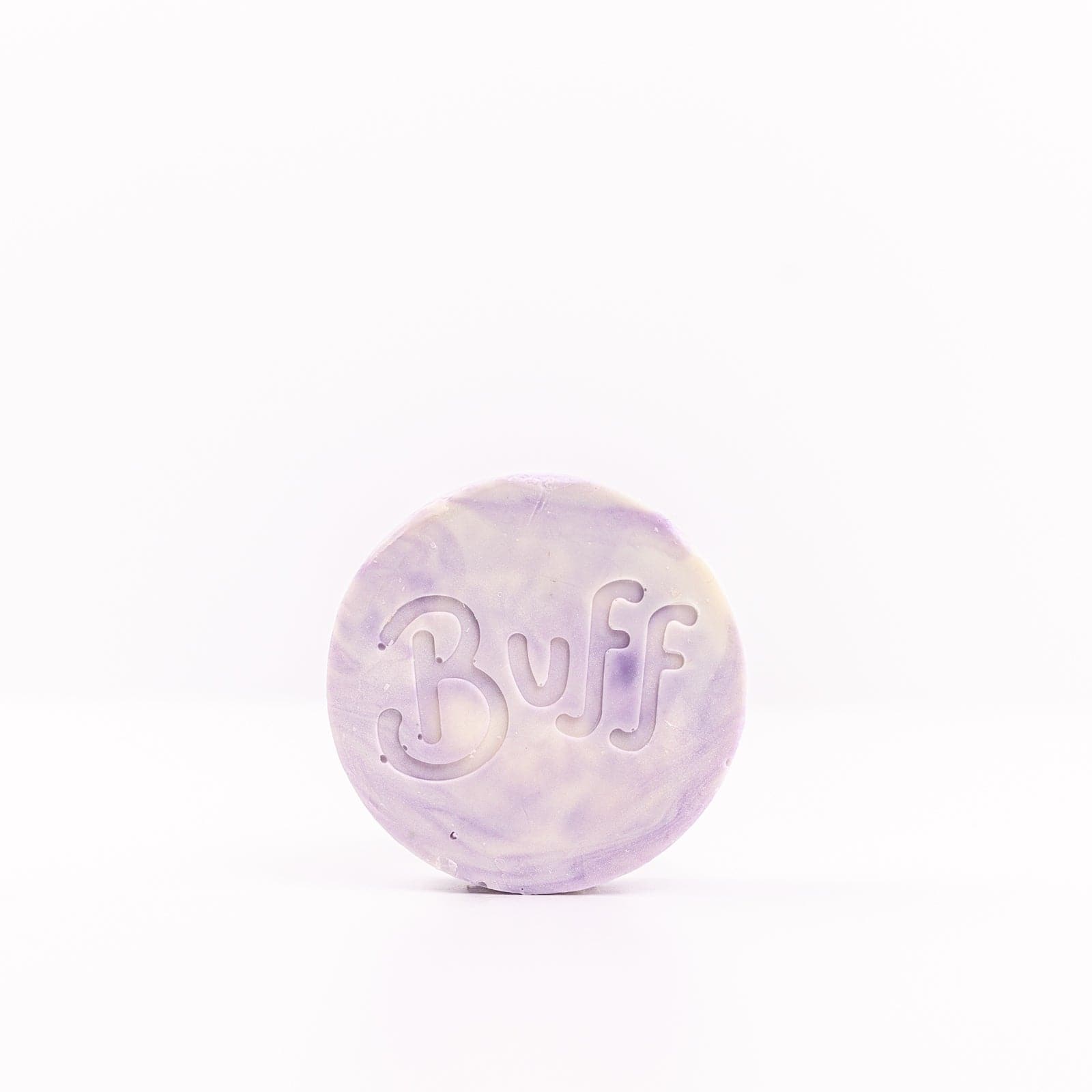 Buff City Soap's love potion multi-colored shave bar with a buff inscription