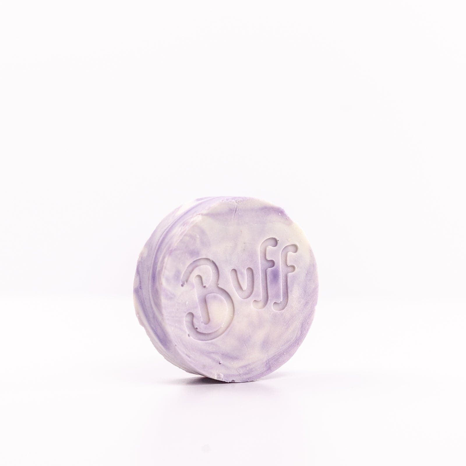 Buff City Soap's love potion multi-colored shave bar with a buff inscription