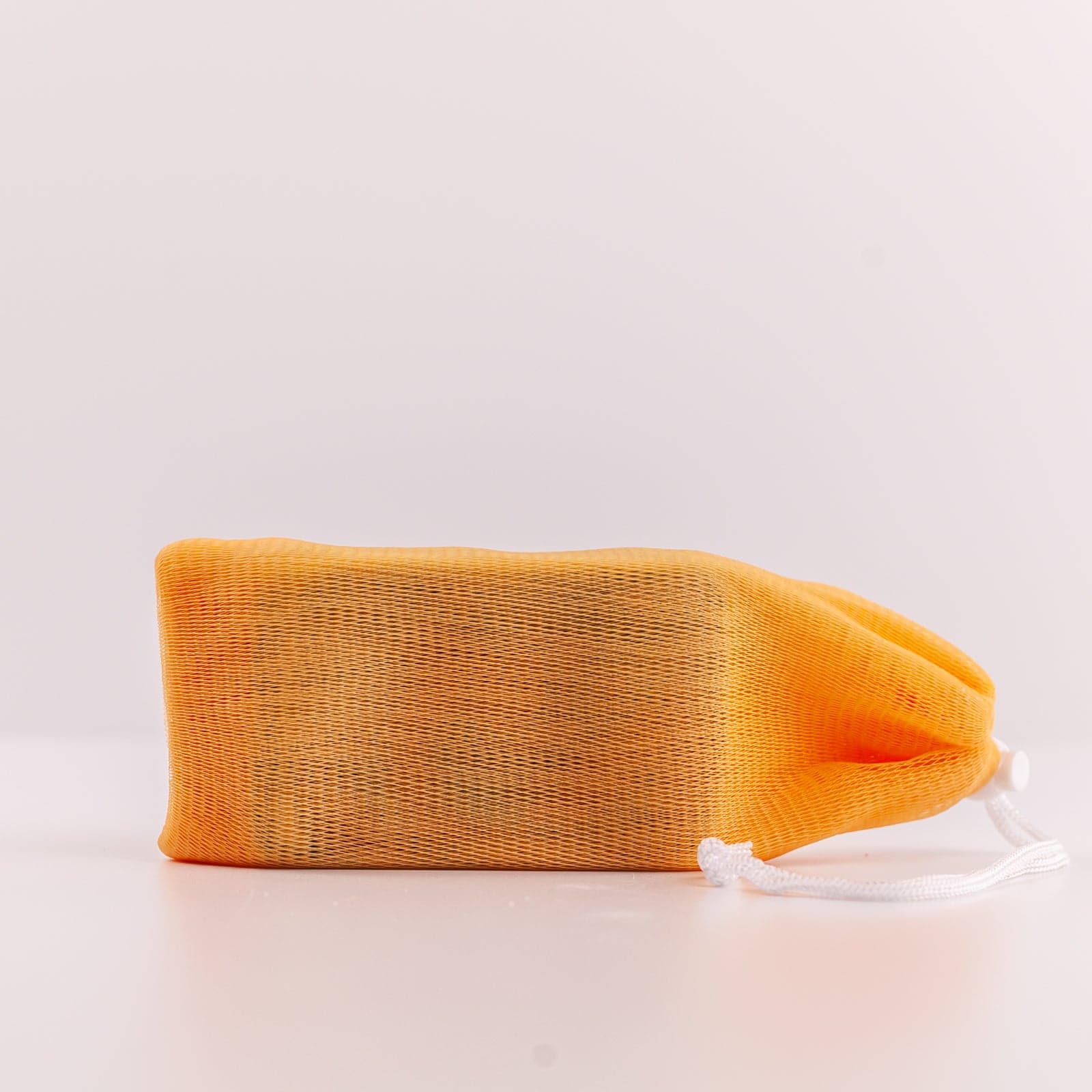 Orange soap sleeve on side