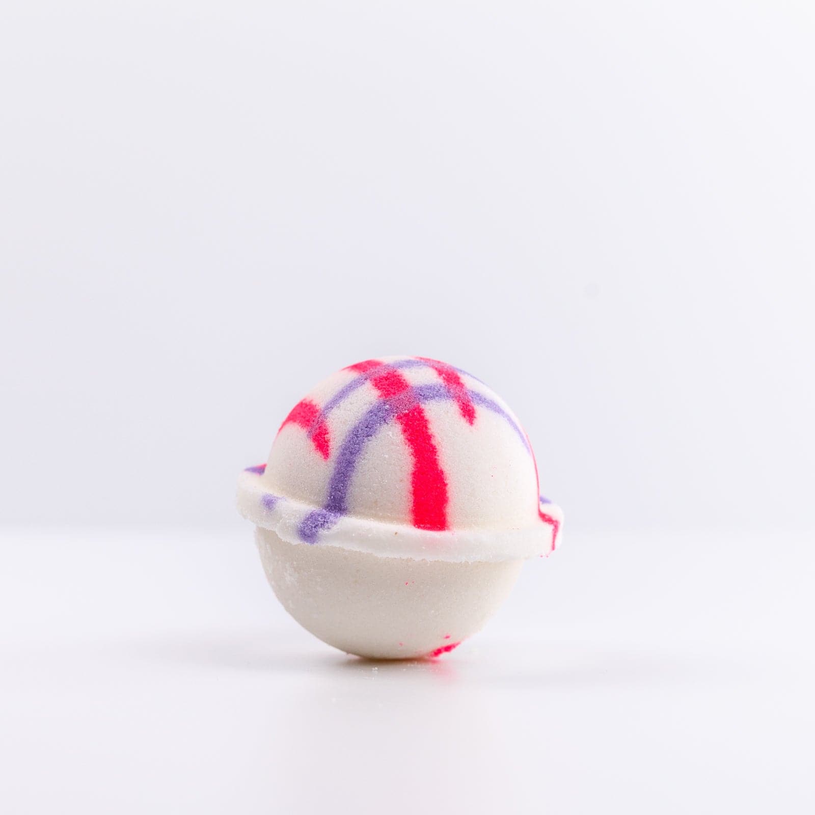 Upright Unicorn Bath Bomb with a pink and purple design